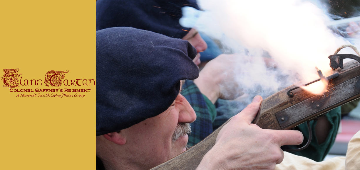 close up of a matchlock musket firing