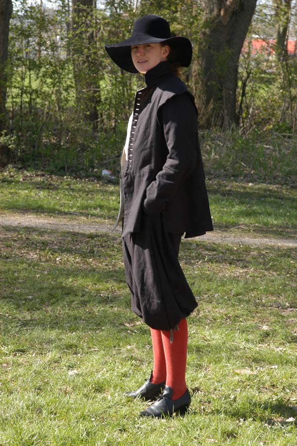 soldier in gray coat and red stockings